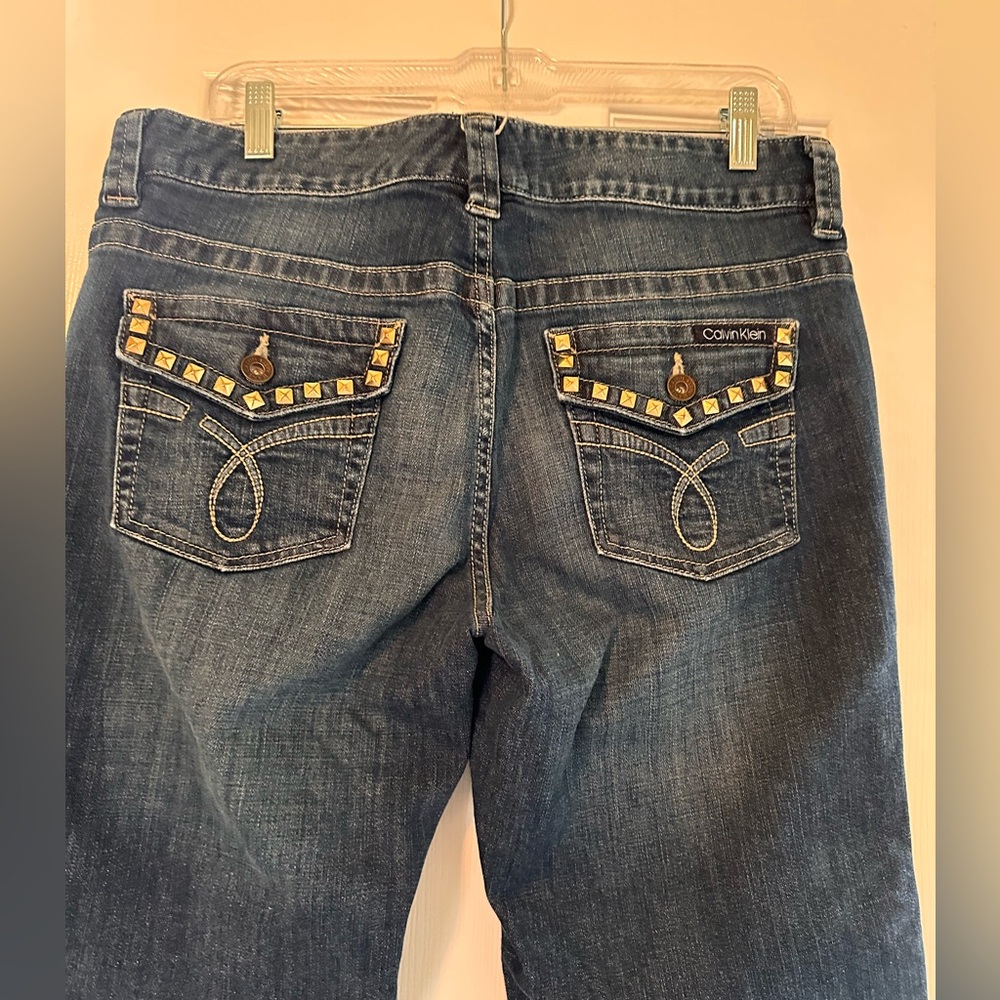 Calvin Klein woman's jeans with decorative pockets size 32/12